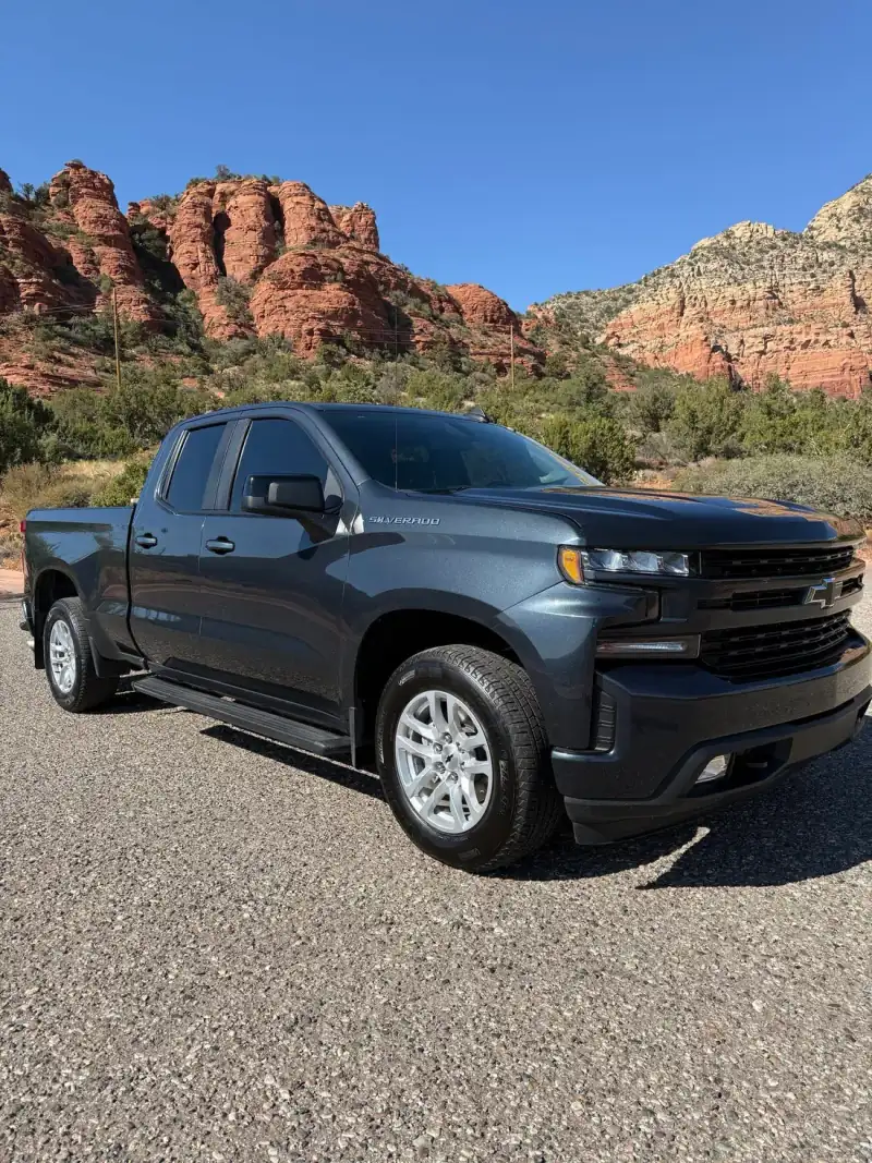 Actual finished Silverado detail by IM Detailing, with Sedona red rocks behind it